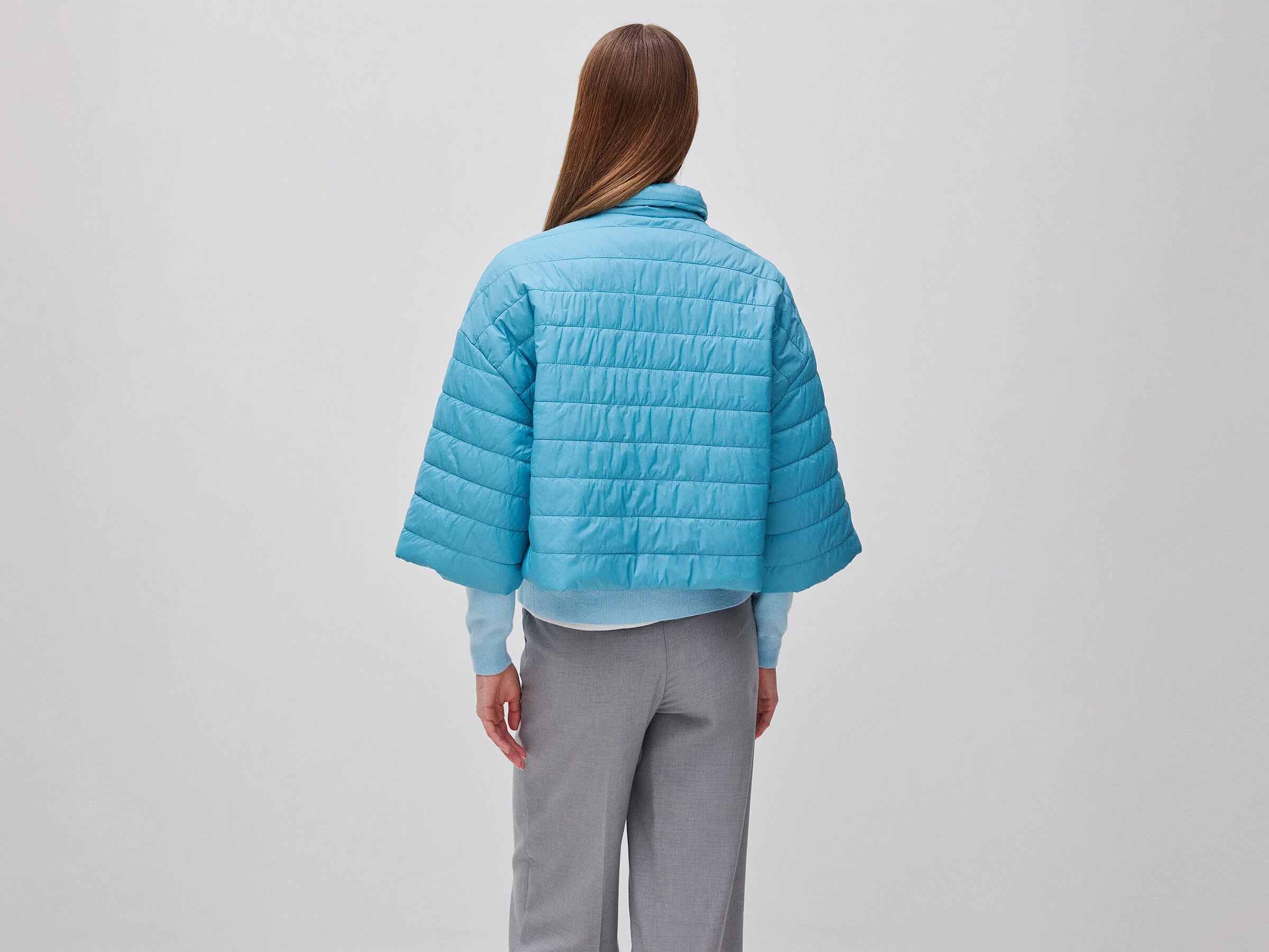 Piumino leggero con manica 3/4