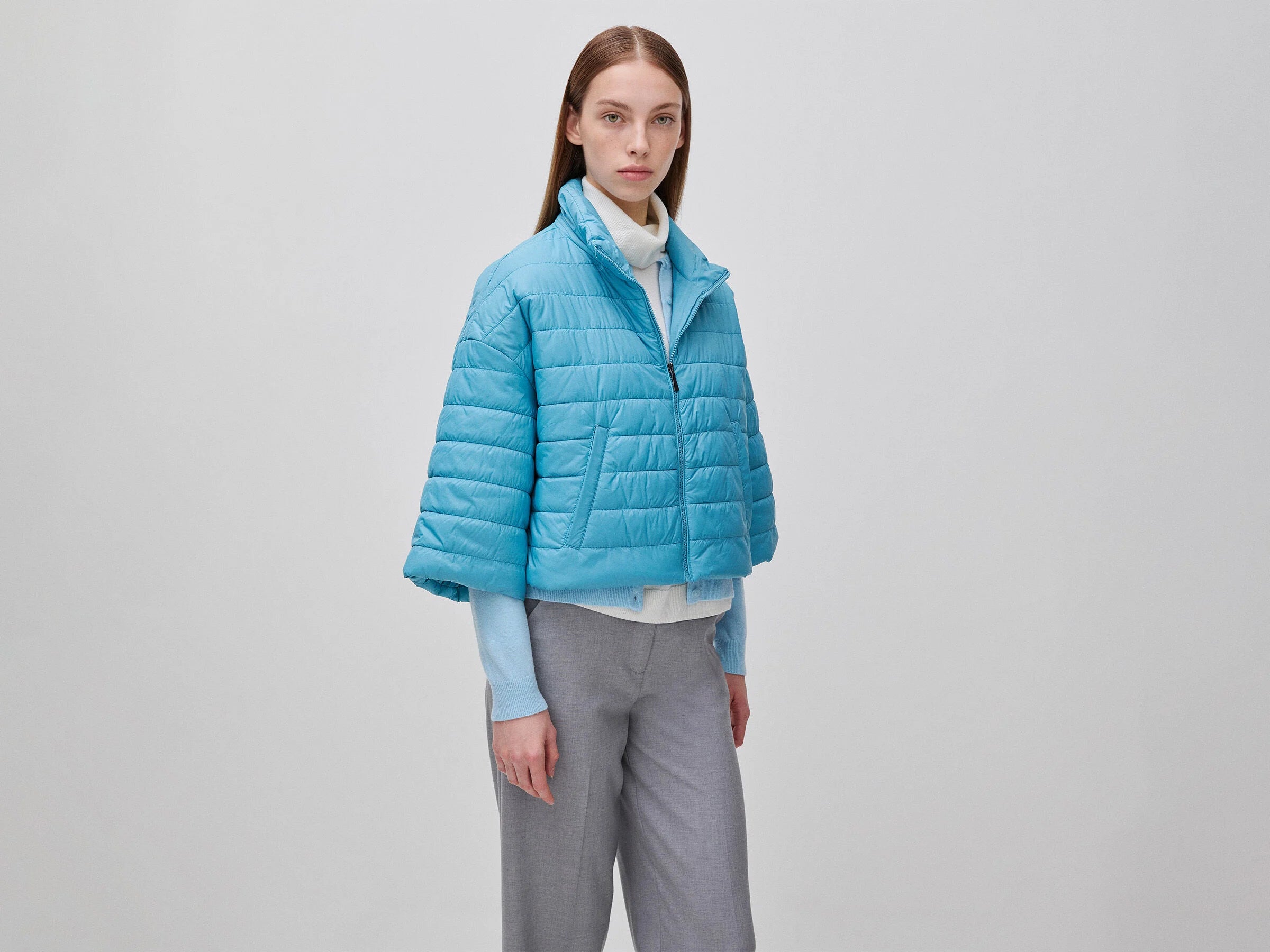 Piumino leggero con manica 3/4