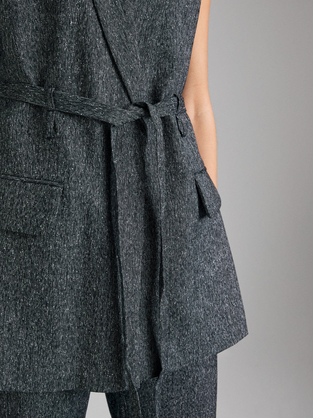 Gilet con cinturina