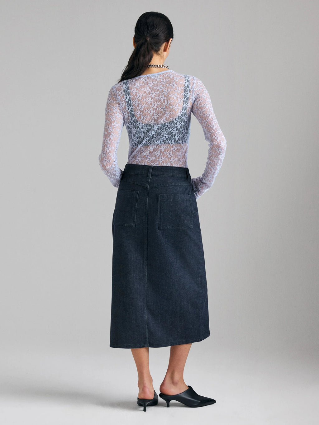 T-shirt in pizzo con arriccio