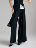 Pantaloni con contrasto